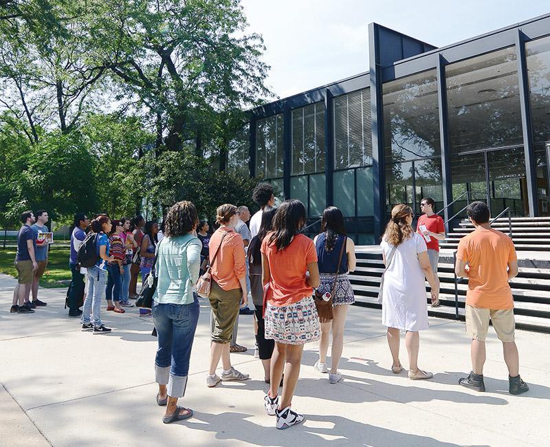 Visiting students and their family members on Main Campus outside of S. R. Crown Hall